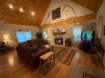 Living Room with a Gas Log Fireplace and a Flat Smart Screen TV